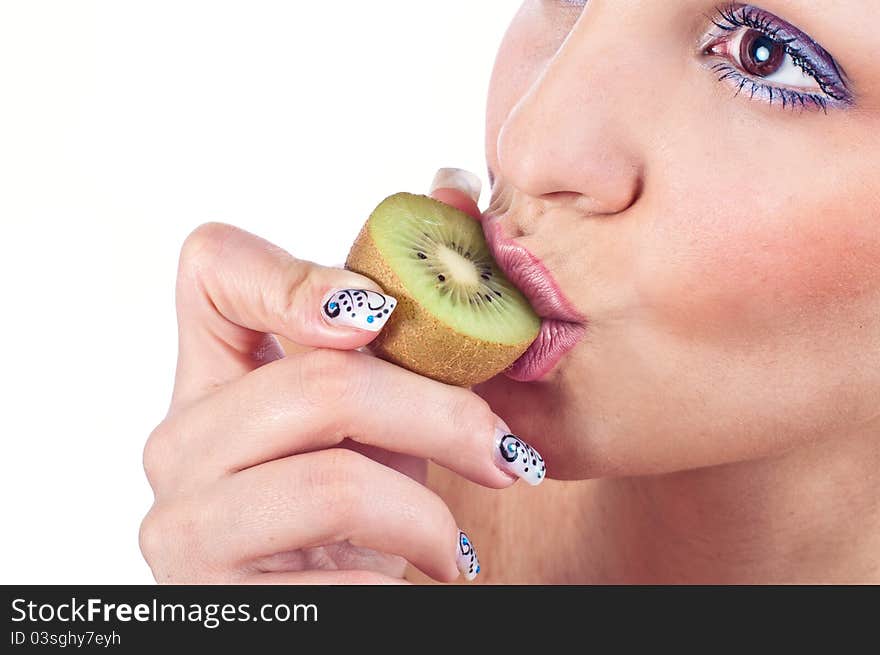 Close up photo of a woman with kiwi