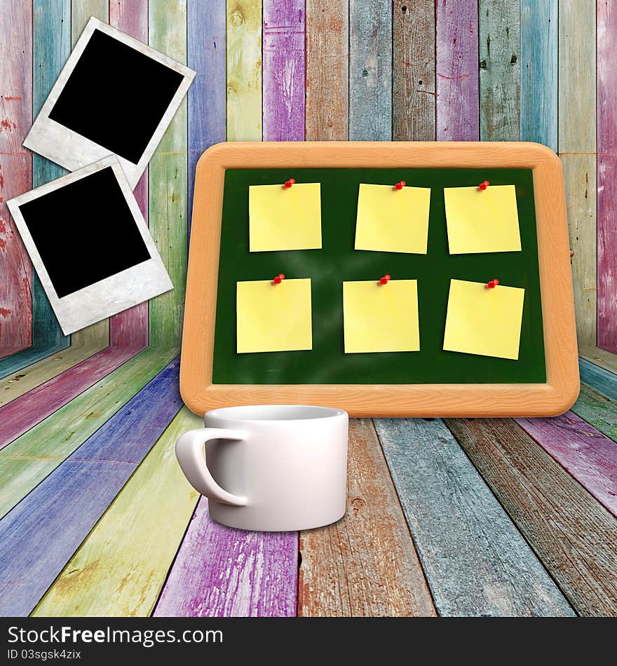 Blackboard and coffee mug on vivid wooden shelves