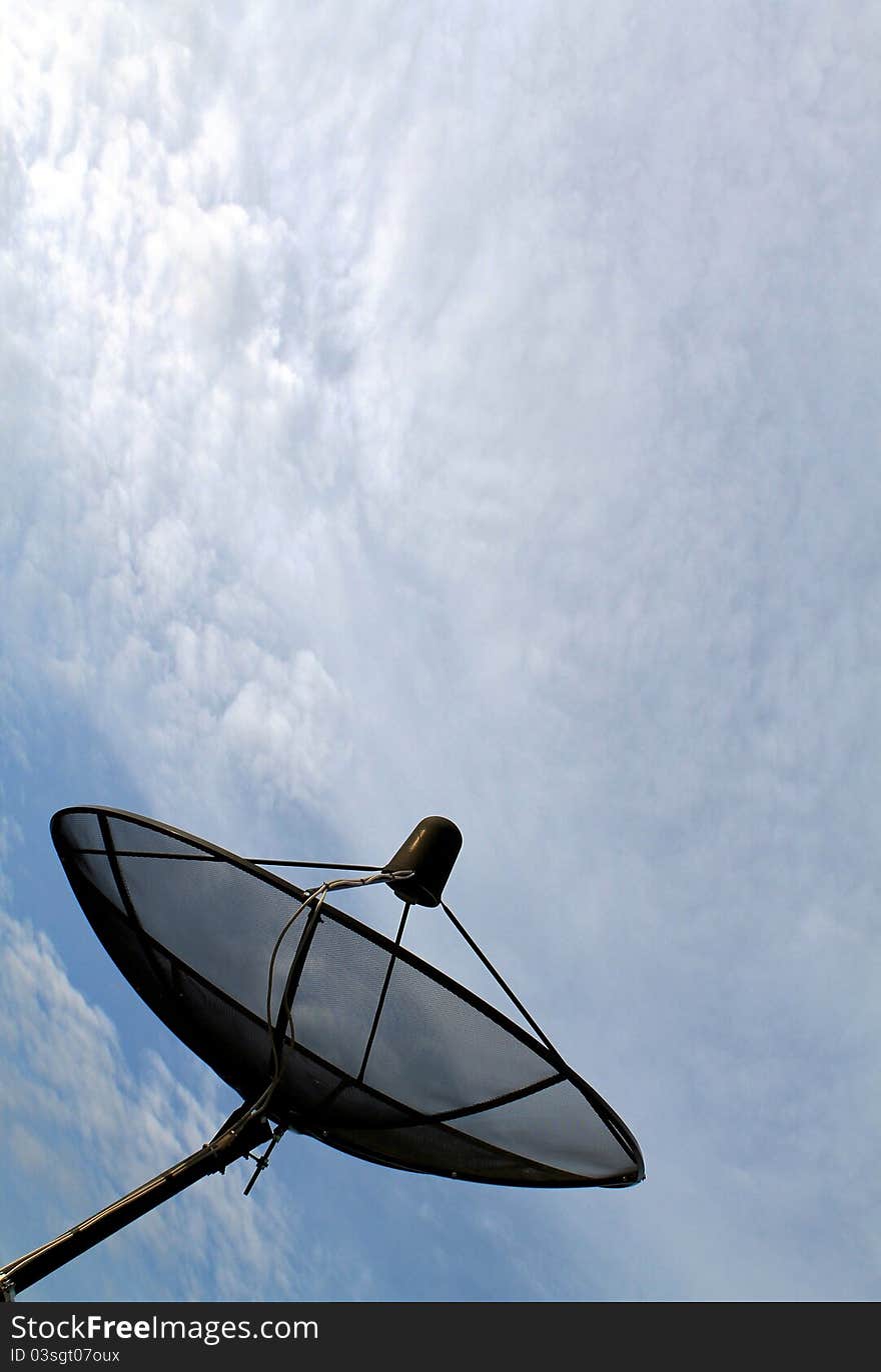 Satelite dish on cloudy sky view