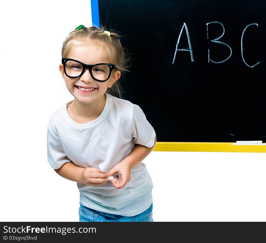 Beautiful little girl on a board. stodio shot