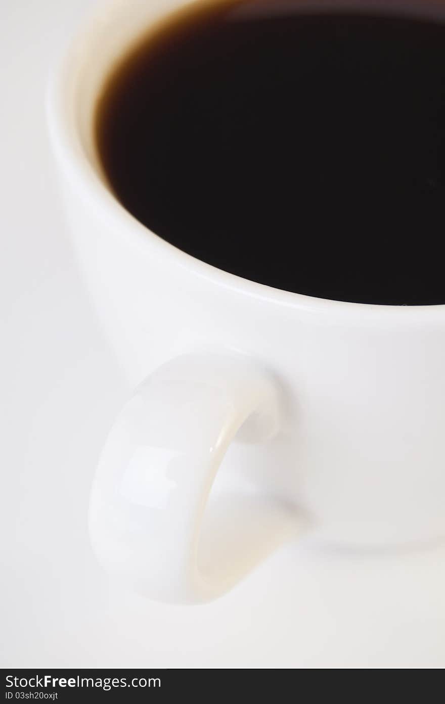 An coffee cup with black java coffee