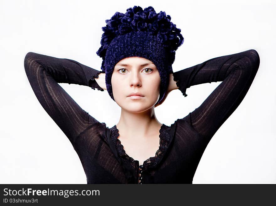 Beautiful woman in a blue hat