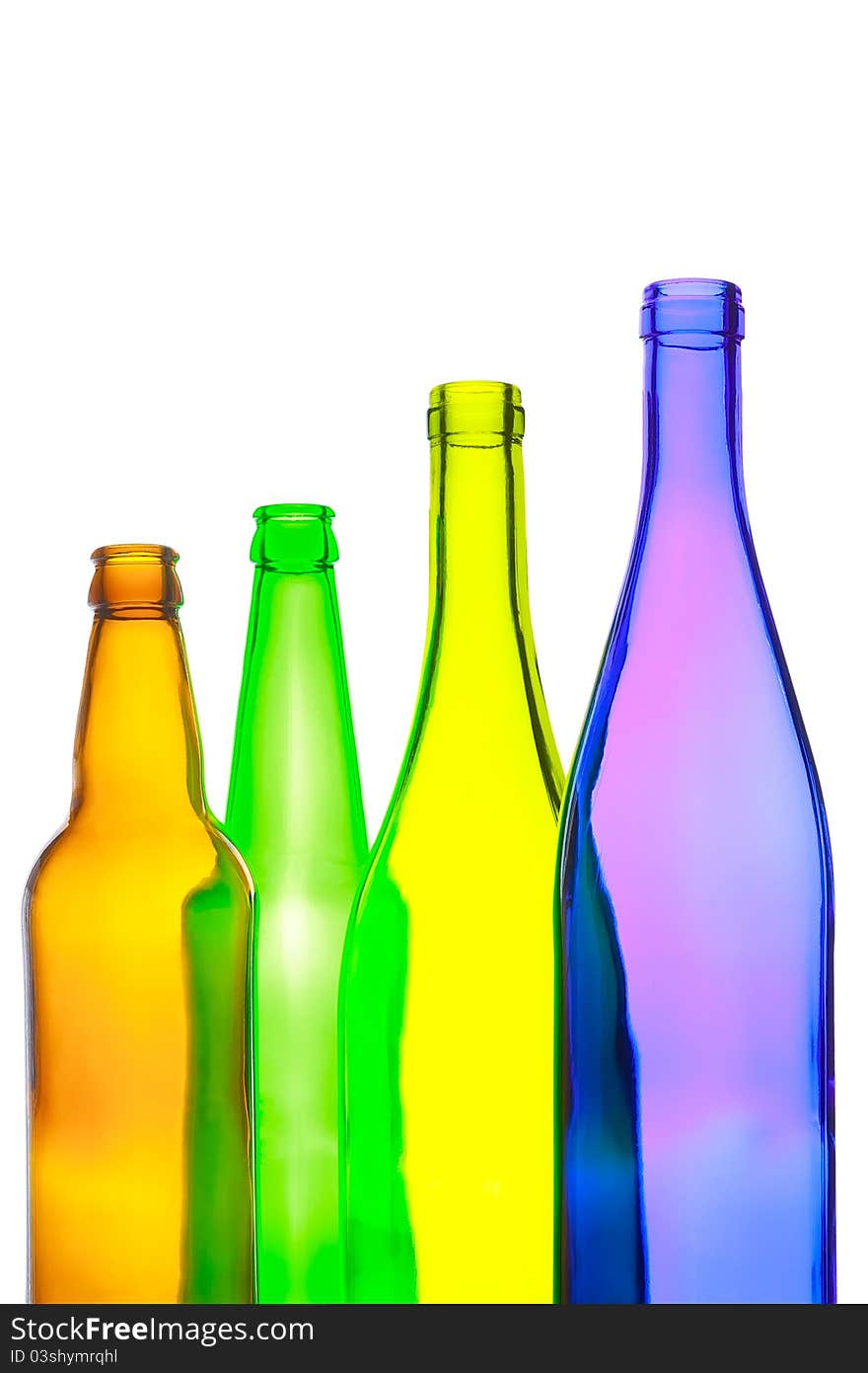 Empty wine and beer bottles on white background