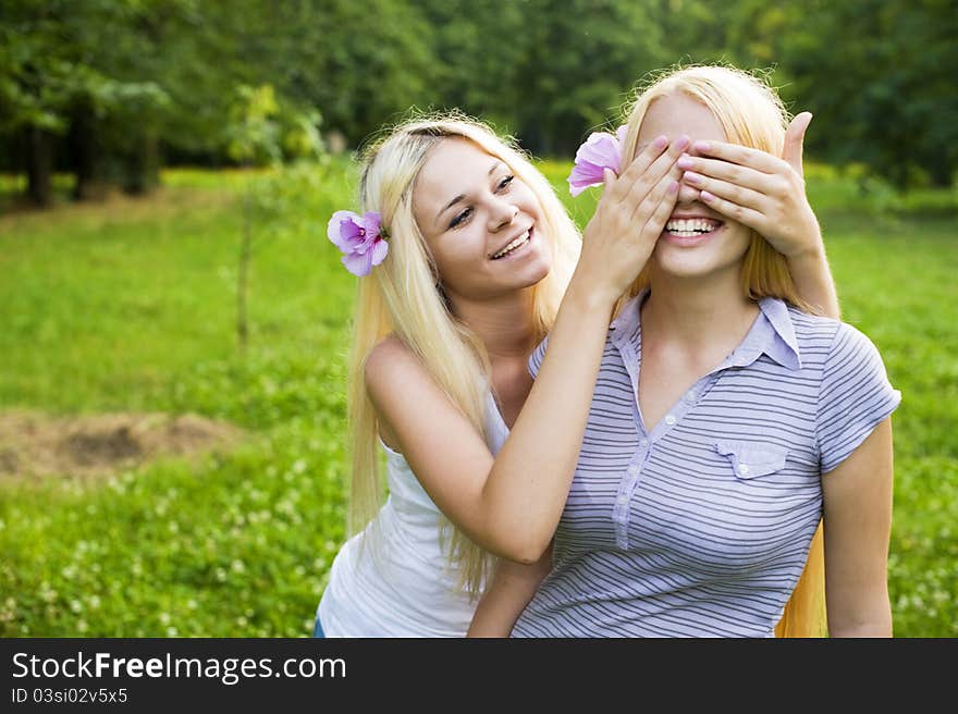 Two attractive sisters displaying the love of family. Two attractive sisters displaying the love of family