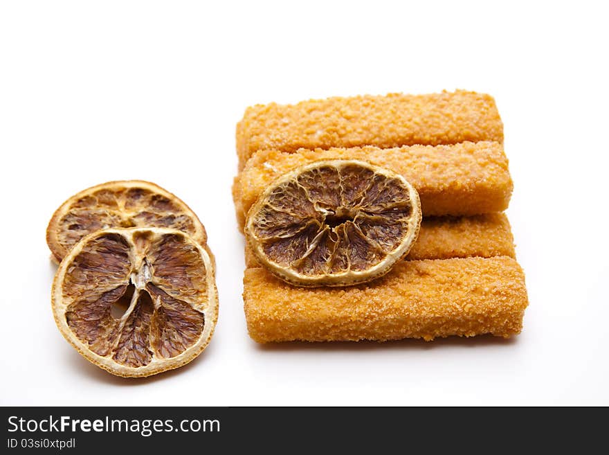 Fish finger breads and with lemon. Fish finger breads and with lemon