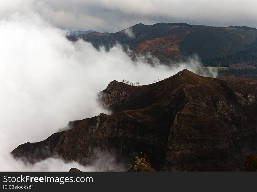 View of the clouds with the peak of Mount