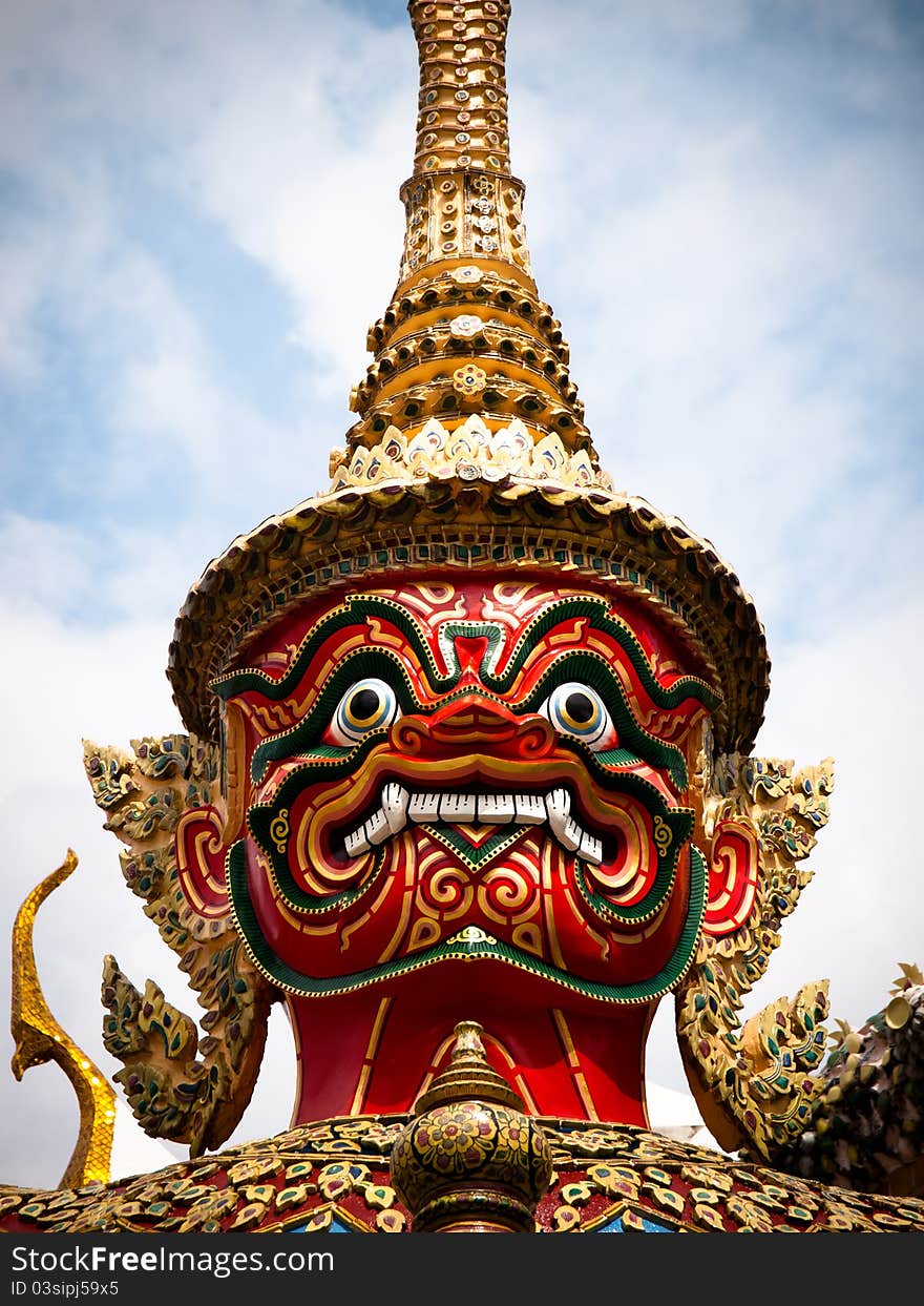 Native Thai style giant statues at The Grand Palace in Bangkok, Thailand