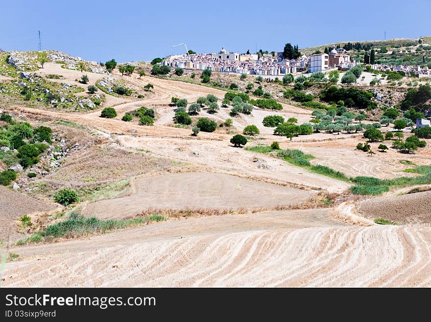 Agricultural fields and old catholic cemetery in Sicily