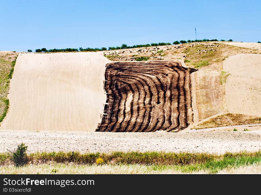 Harvested fields on hill slope