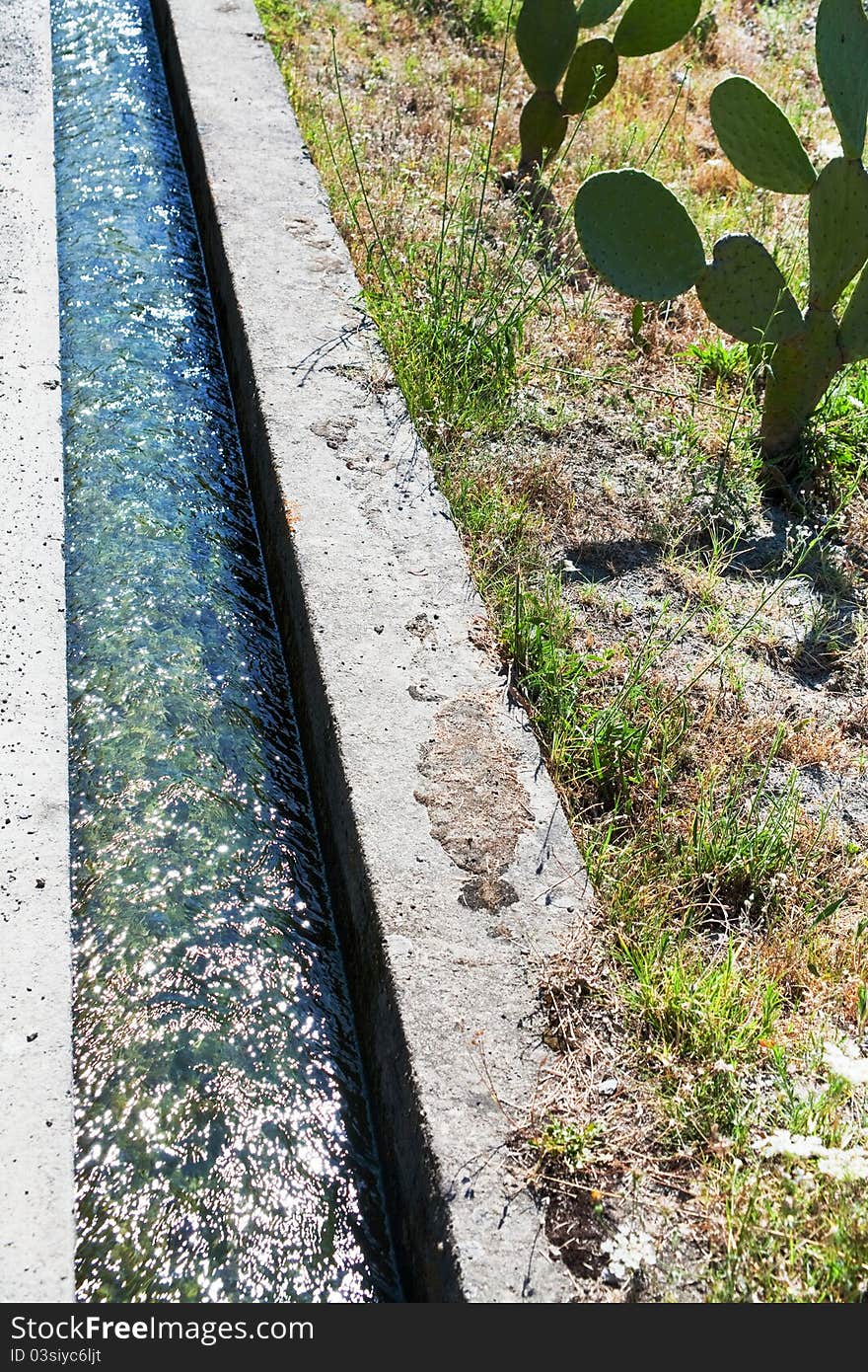 Irrigation ditch in Sicily in summer day