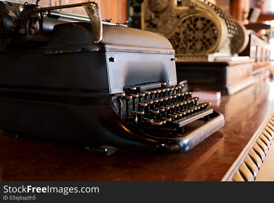 Old vintage typewriter on the brown table