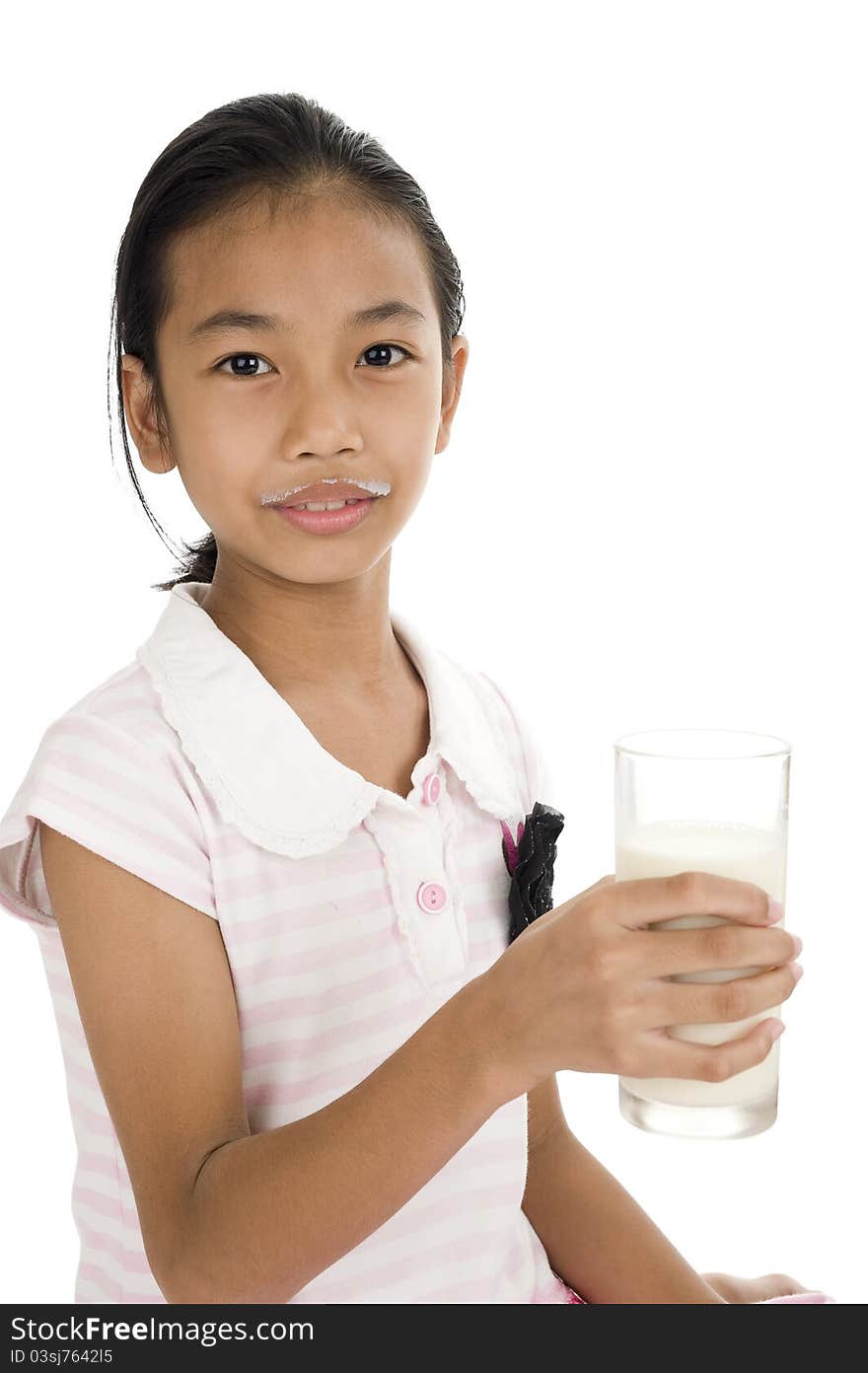 Asian teeny with a glass of milk, isolated on white background