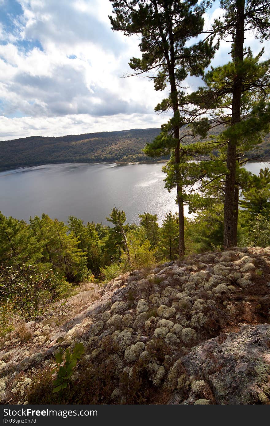 Wind, clear water lake, forest and sky. Wind, clear water lake, forest and sky