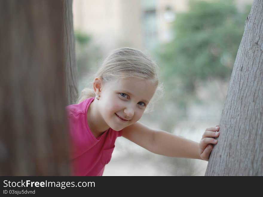 Children girl poses outdoors nature. Children girl poses outdoors nature