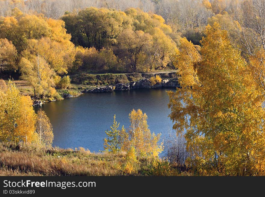 Lake surrounded with autumn trees. Lake surrounded with autumn trees.