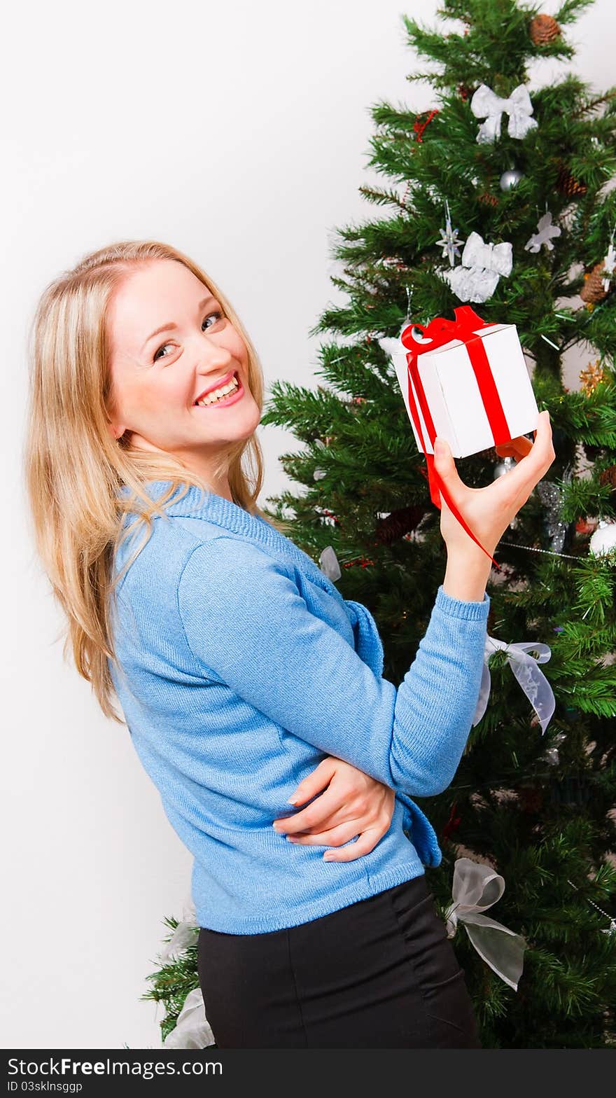 Happy woman with gift-box