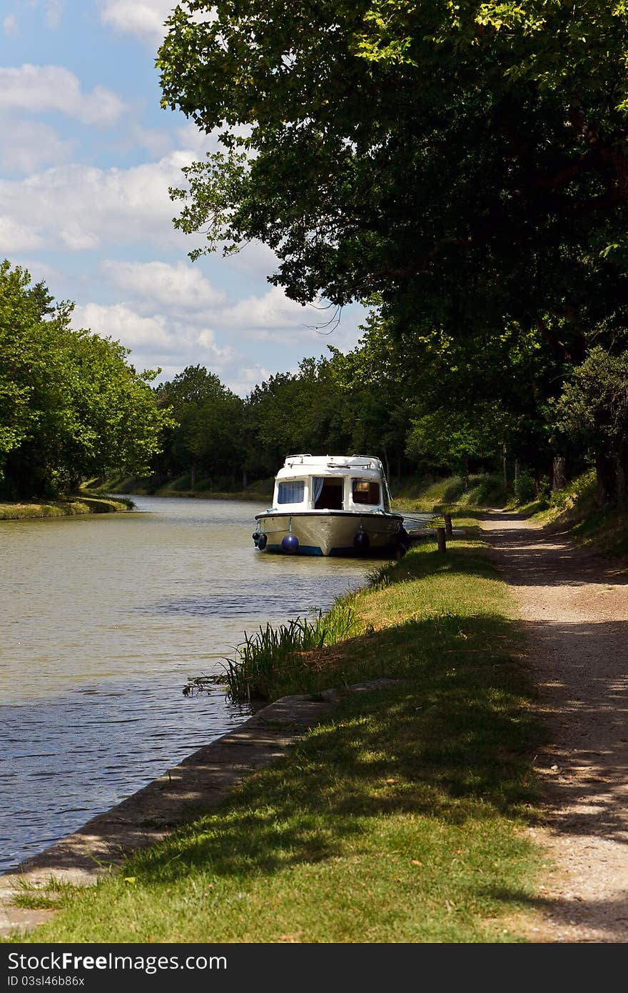 Boat moored on the river, France