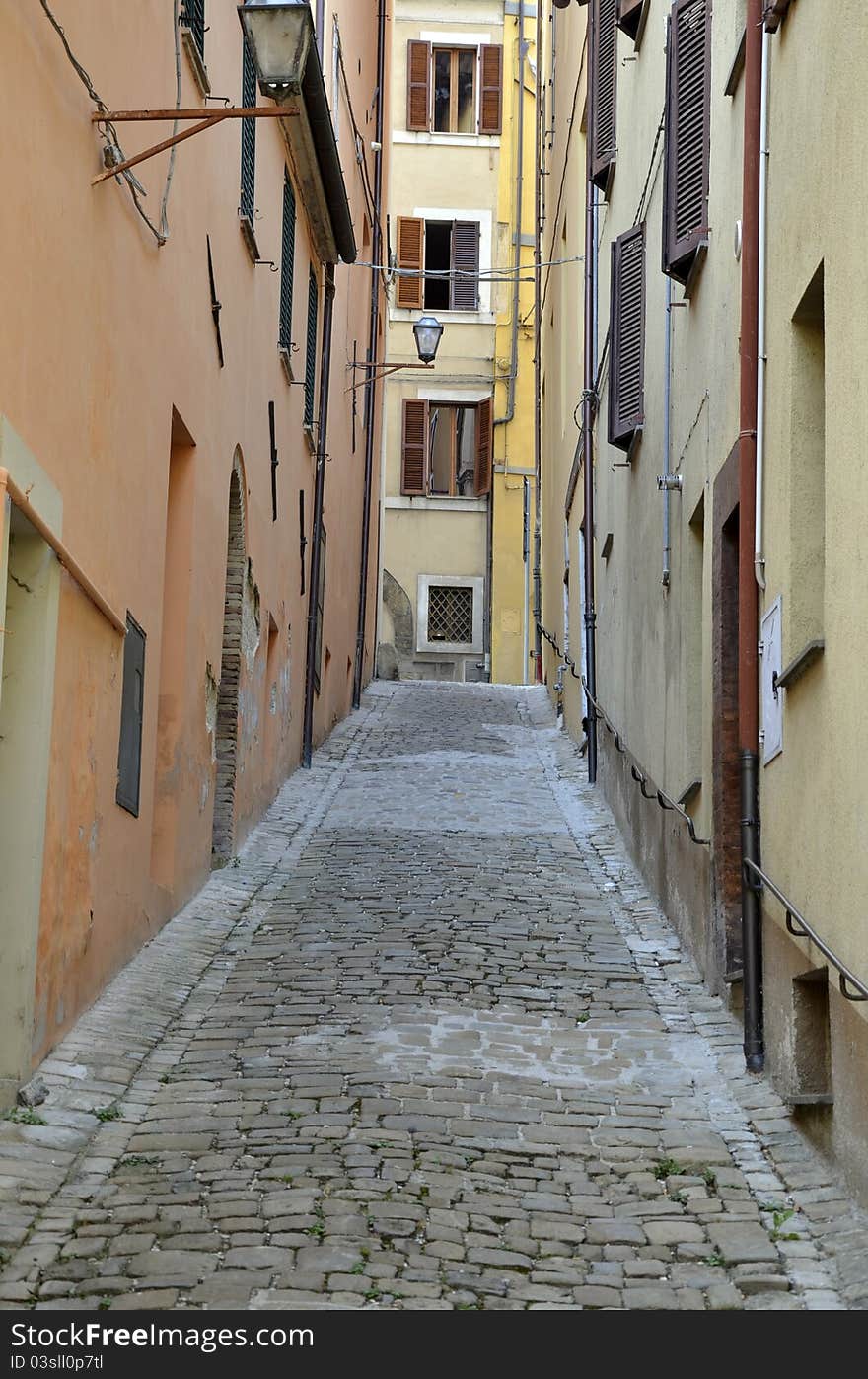 Narrow street in Camerino city of Italy near Ancona and Macerata, at 200 km far from Rome. Narrow street in Camerino city of Italy near Ancona and Macerata, at 200 km far from Rome.