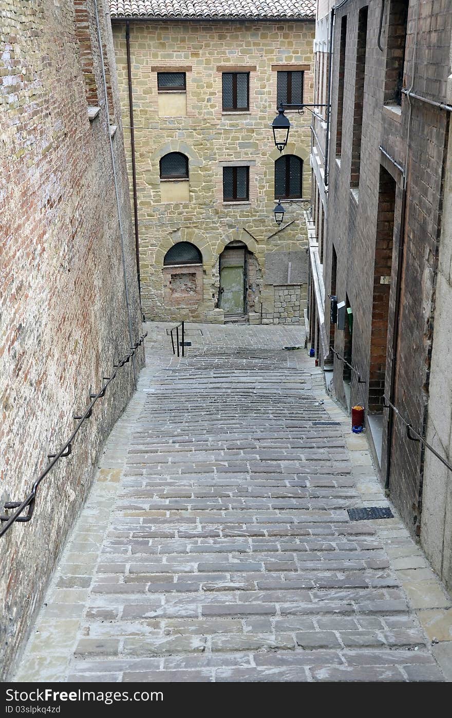 Narrow street in Camerino city of Italy near Ancona and Macerata. Narrow street in Camerino city of Italy near Ancona and Macerata