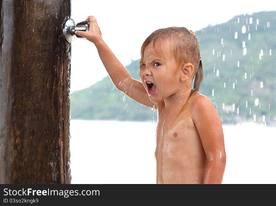 small girl under shower