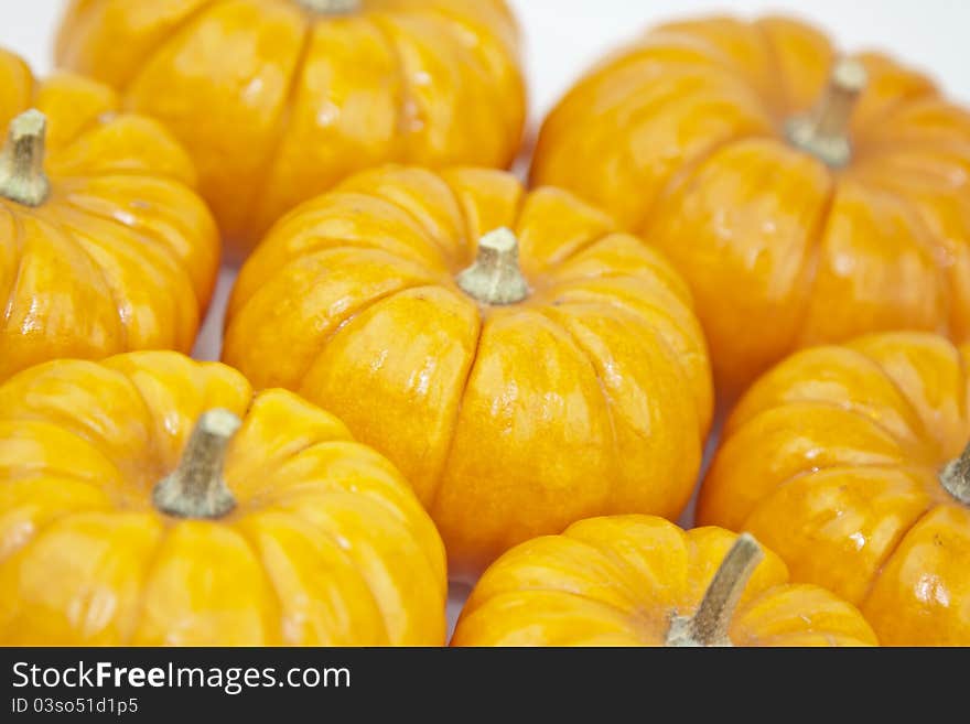 Various of orange pumpkins on a white background