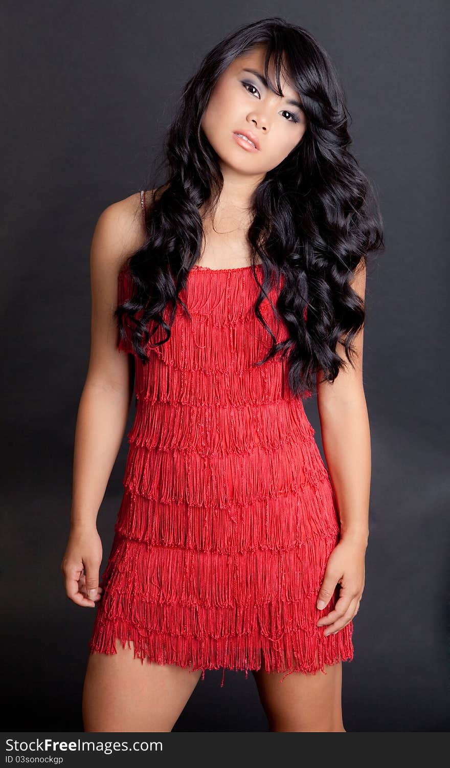 Pretty Young Woman in Red Flapper Dress