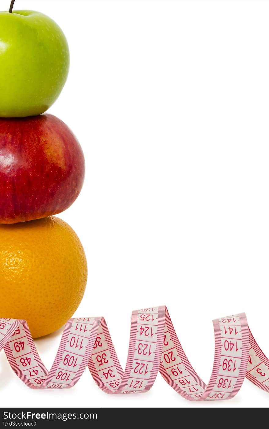 Fruit on a white background with a tape measure. Fruit on a white background with a tape measure