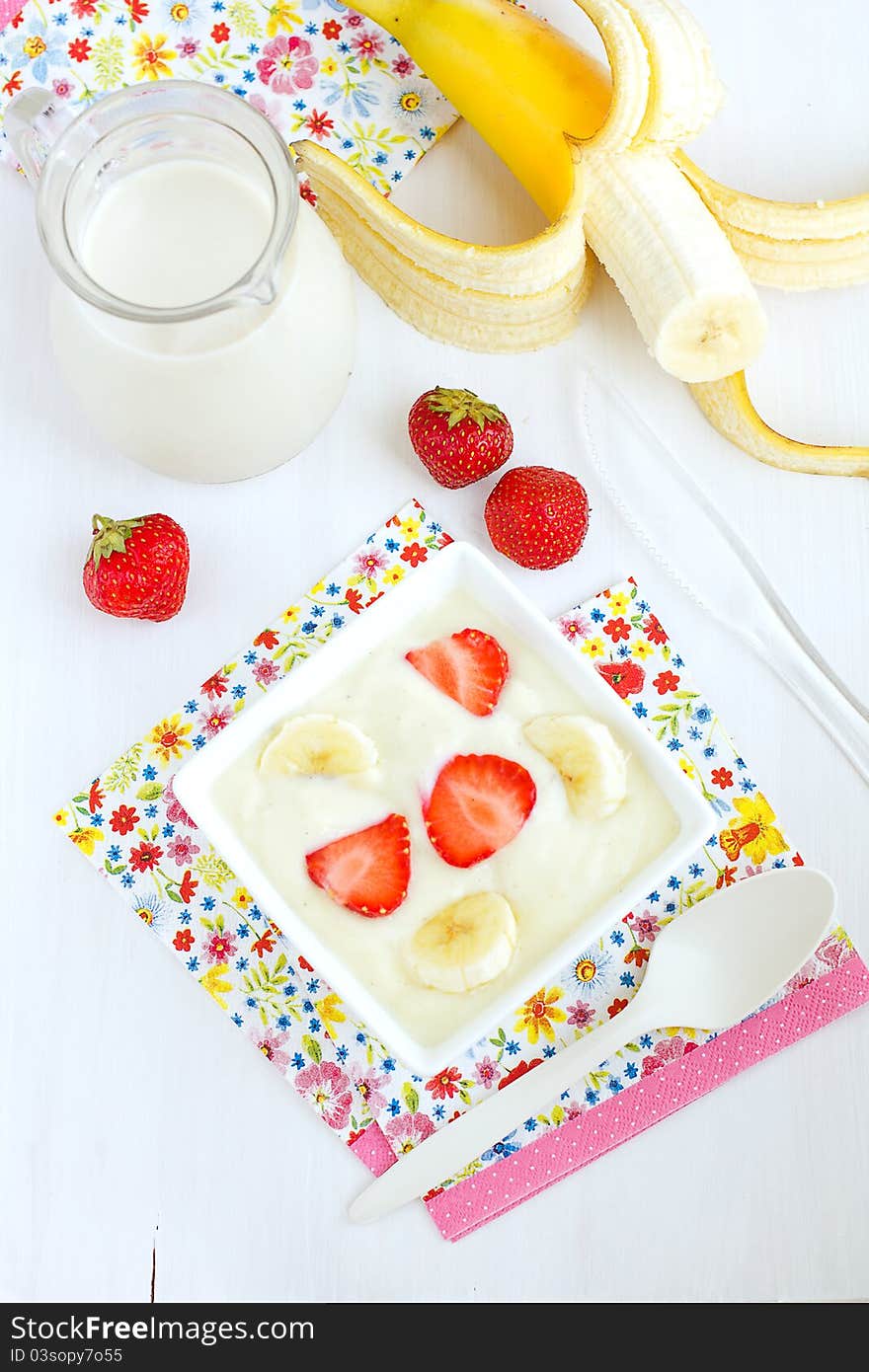 Soy yogurt and milk, strawberries and banana. Soy yogurt and milk, strawberries and banana