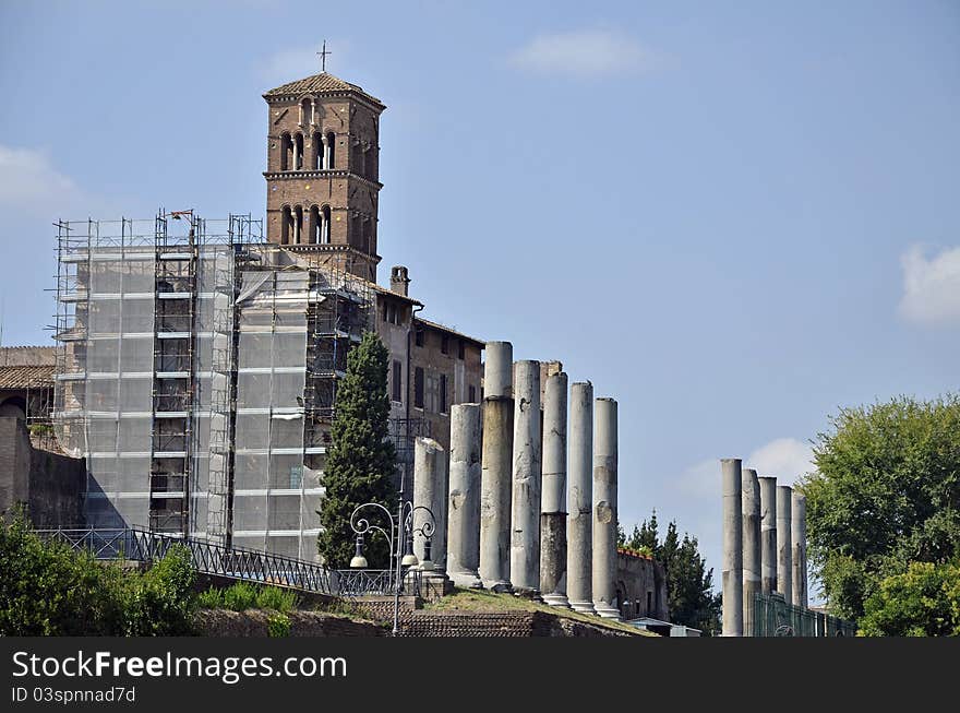 Outdoor columns and church in historical center of Rome