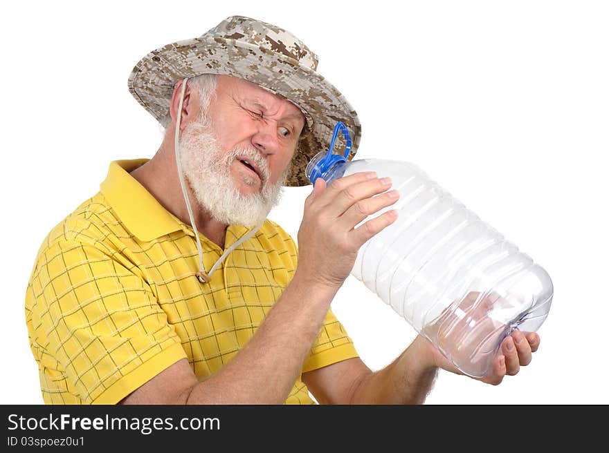 Senior man looking into empty bottle