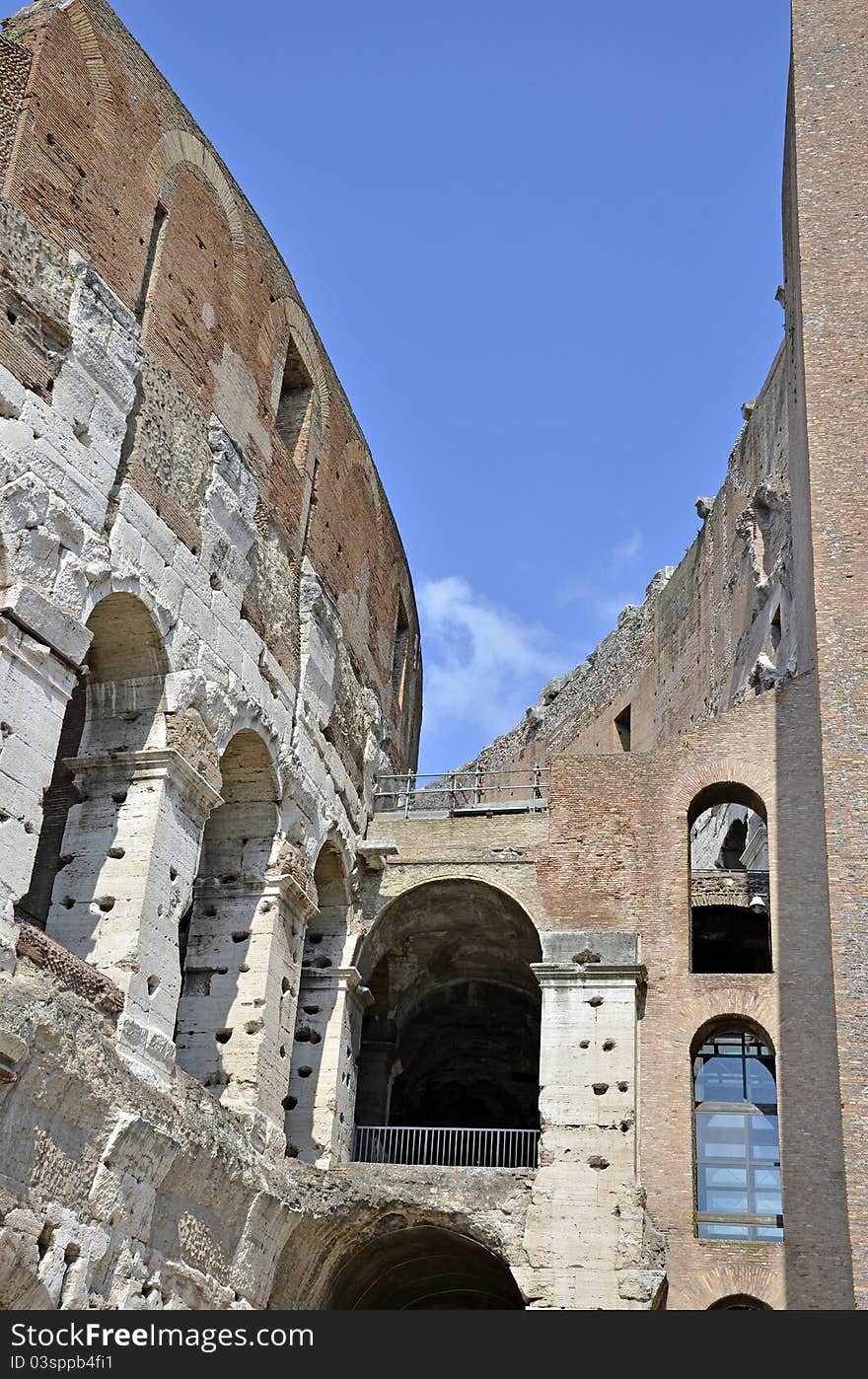 Side of Colosseum in the historical center of Rome. Side of Colosseum in the historical center of Rome