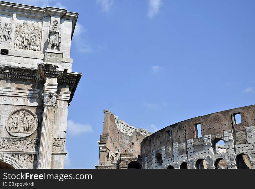 View of Colosseum and Constantine gate in the historical center of Rome. View of Colosseum and Constantine gate in the historical center of Rome