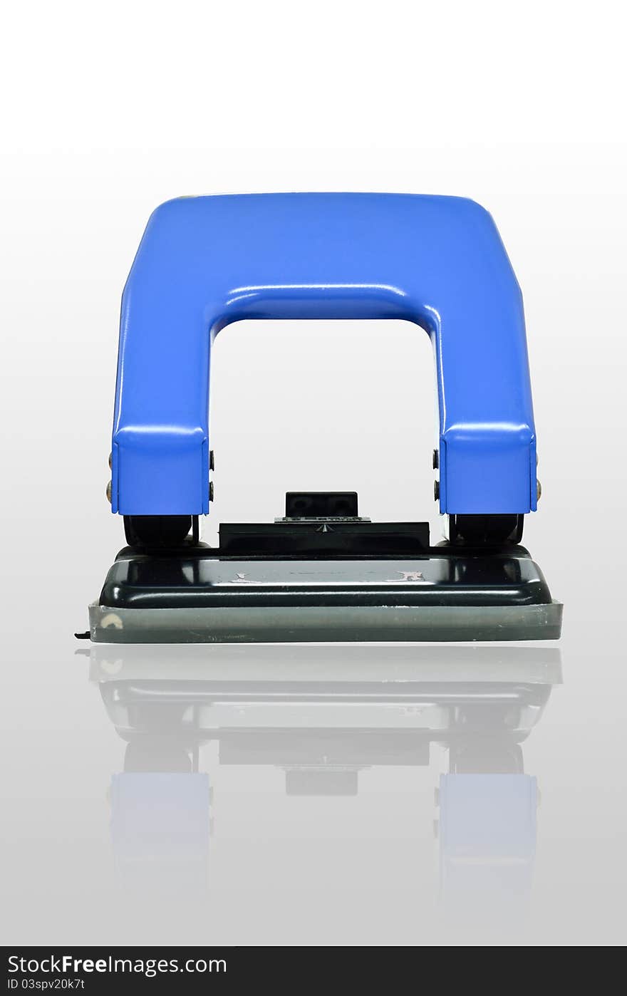 A Blue Hole Punch Used for Filing Paper. A Blue Hole Punch Used for Filing Paper