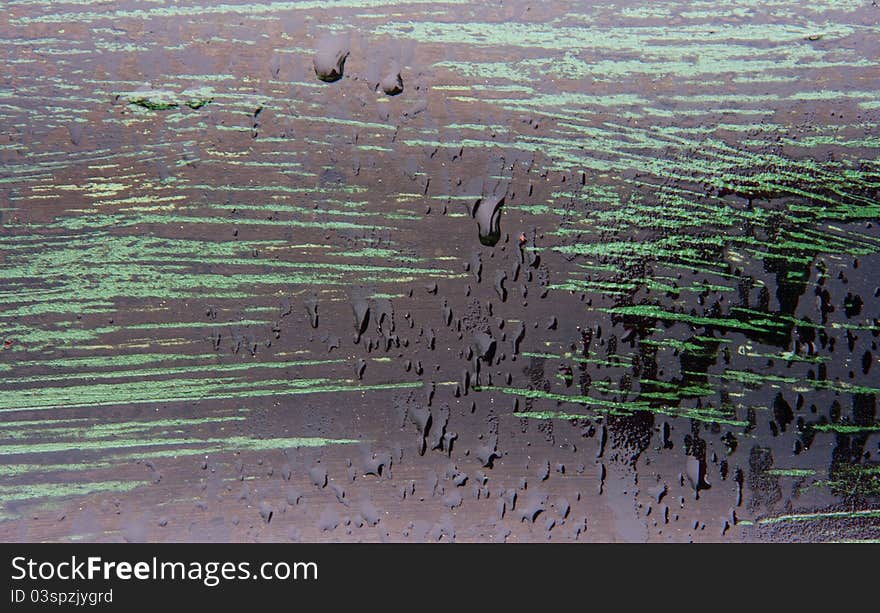 Drips Of Water On Textured Metal