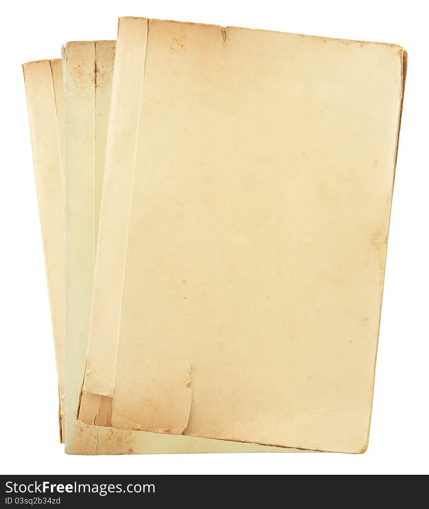 Pile of old book pages isolated on white