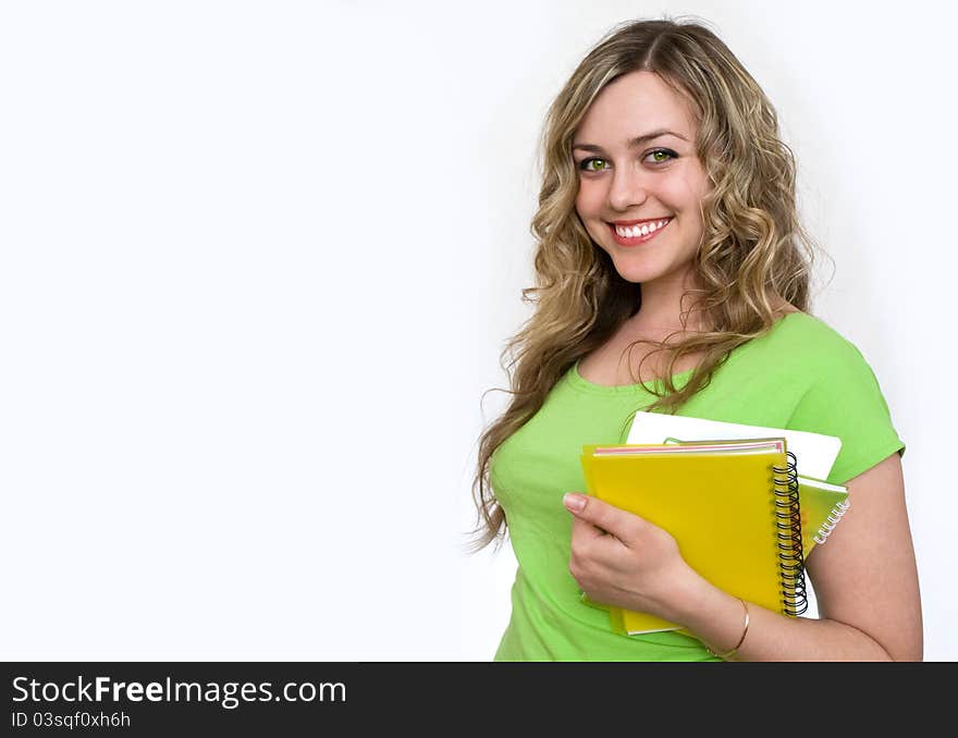 Woman in the green jersey with a notebook. Woman in the green jersey with a notebook