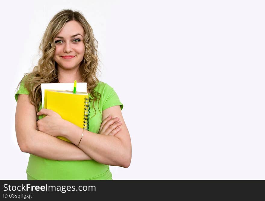 Woman in the green jersey with a notebook. Woman in the green jersey with a notebook