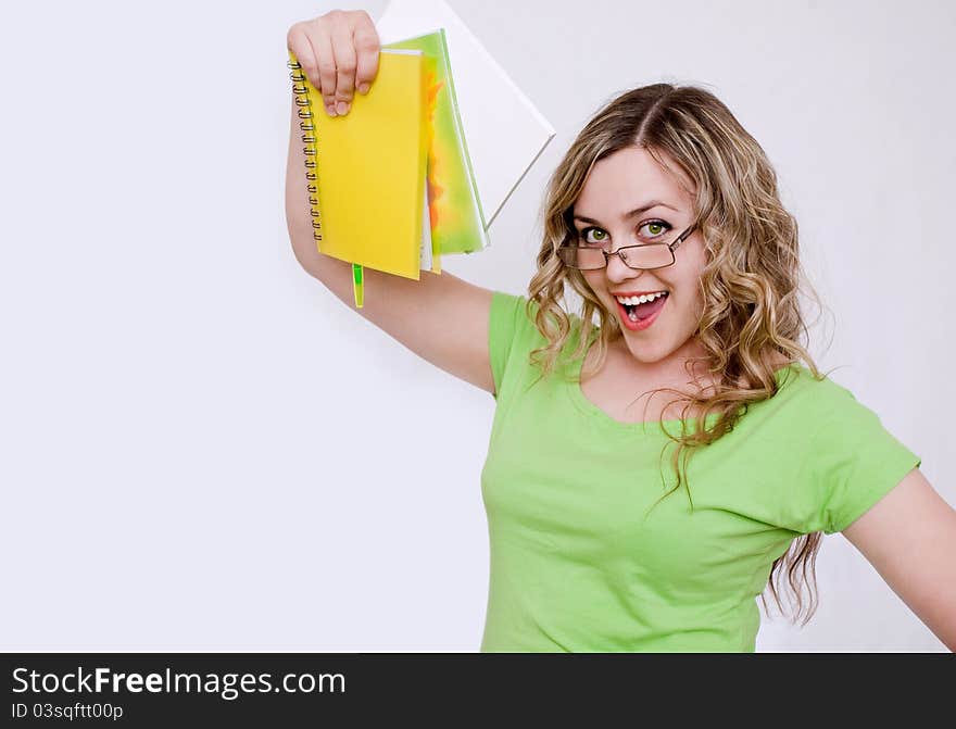 Woman in the green jersey with a notebook. Woman in the green jersey with a notebook