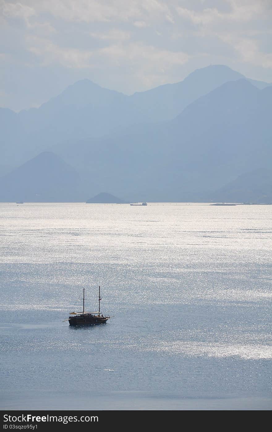 Boat in the bay at Antalya, Turkey, in the Mediterranean sea. Boat in the bay at Antalya, Turkey, in the Mediterranean sea