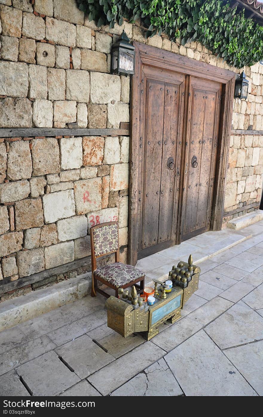 A traditional shoe shine box in an alley in Antalya, Turkey. A traditional shoe shine box in an alley in Antalya, Turkey