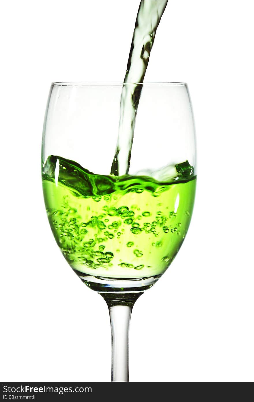 Green Cocktail Into Glass