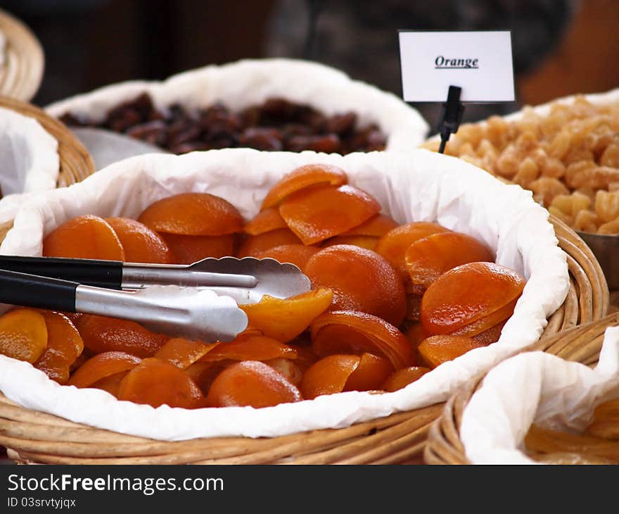 Fresh peeled oranges, in a basket at marketplace. Fresh peeled oranges, in a basket at marketplace