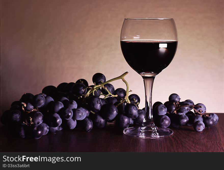 Grapes and  glass.