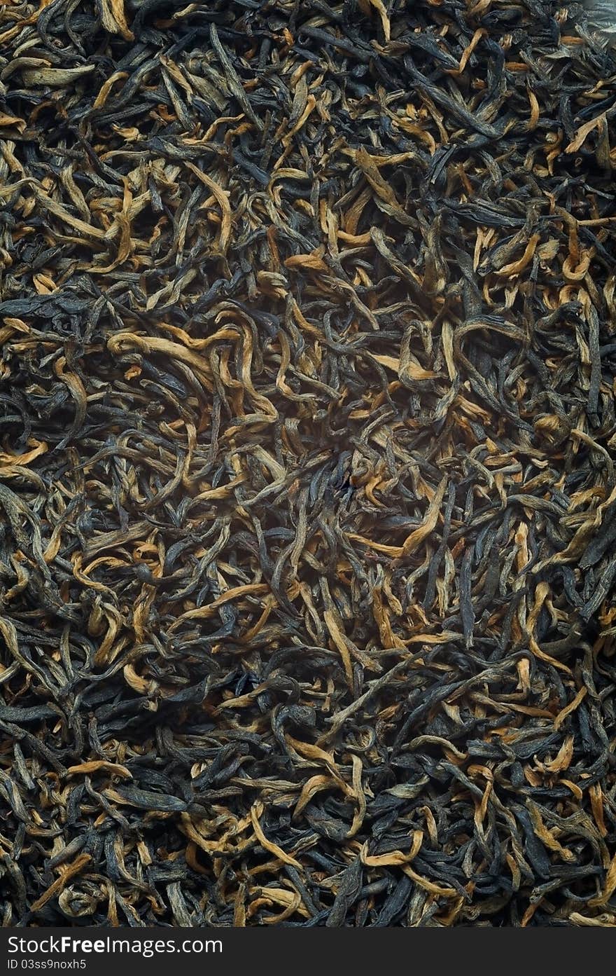 Black tea loose dried tea leaves, background. Black tea loose dried tea leaves, background