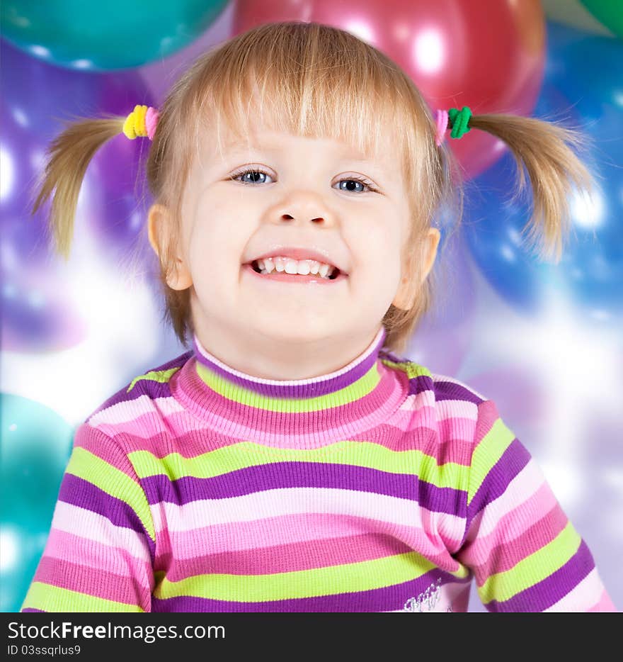 Foto-portrait of a cheerful little girl. Foto-portrait of a cheerful little girl