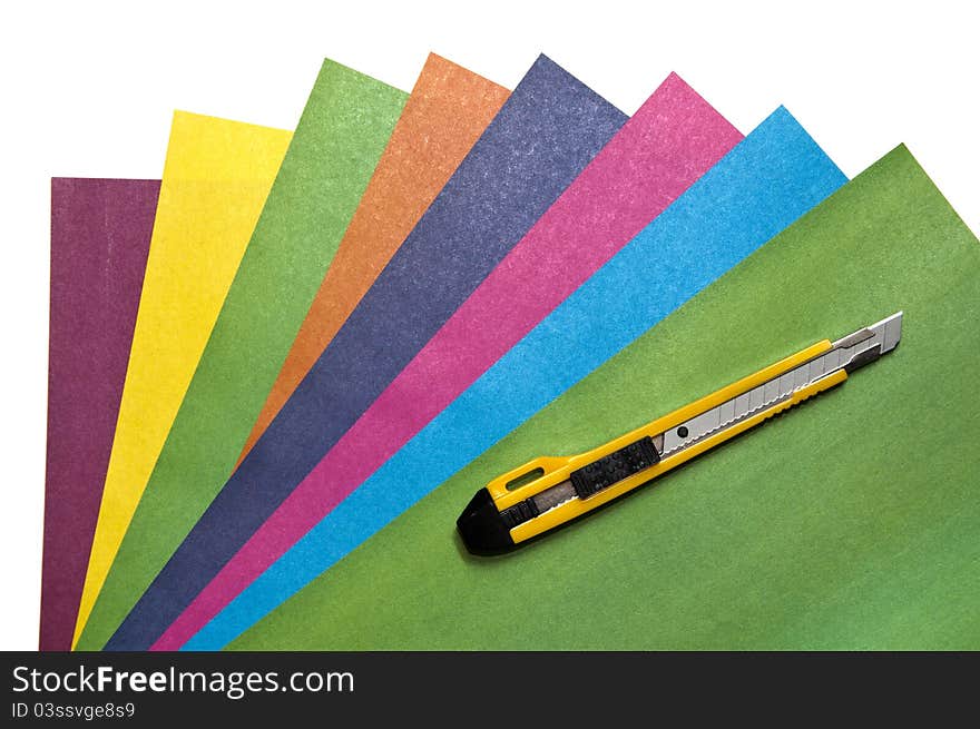 Knife for a paper on sheets of a color paper