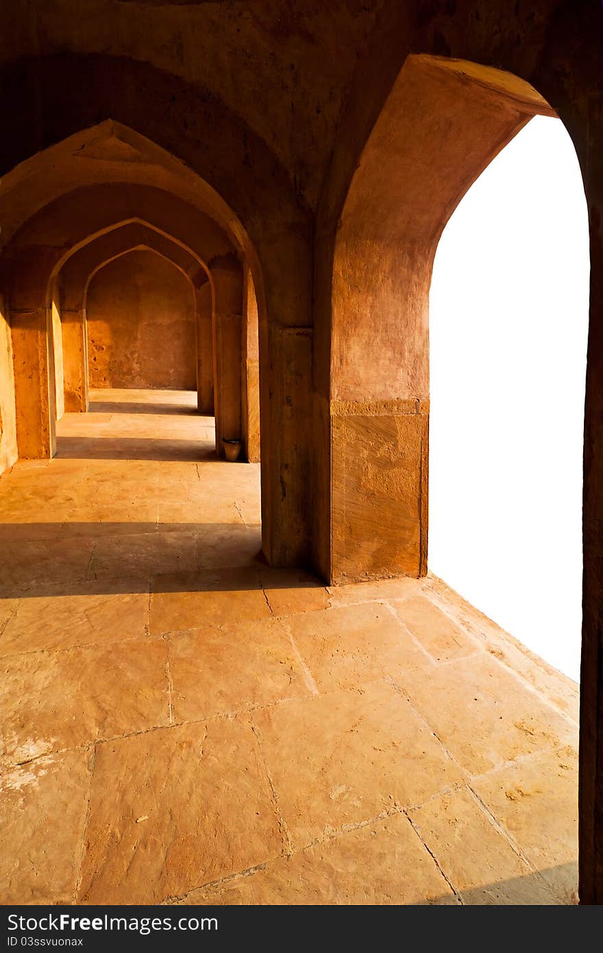 Ancient ruins: corridor with arches