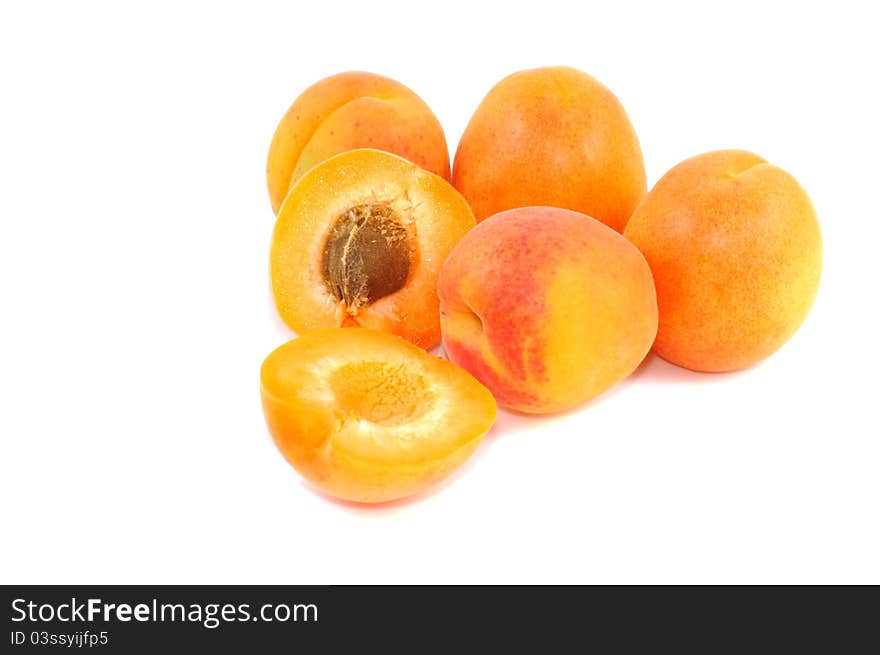 Fresh apricot fruits on a  white background. Fresh apricot fruits on a  white background