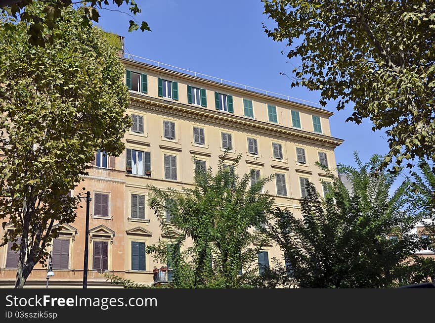 Modern building and vegetation in center of rome