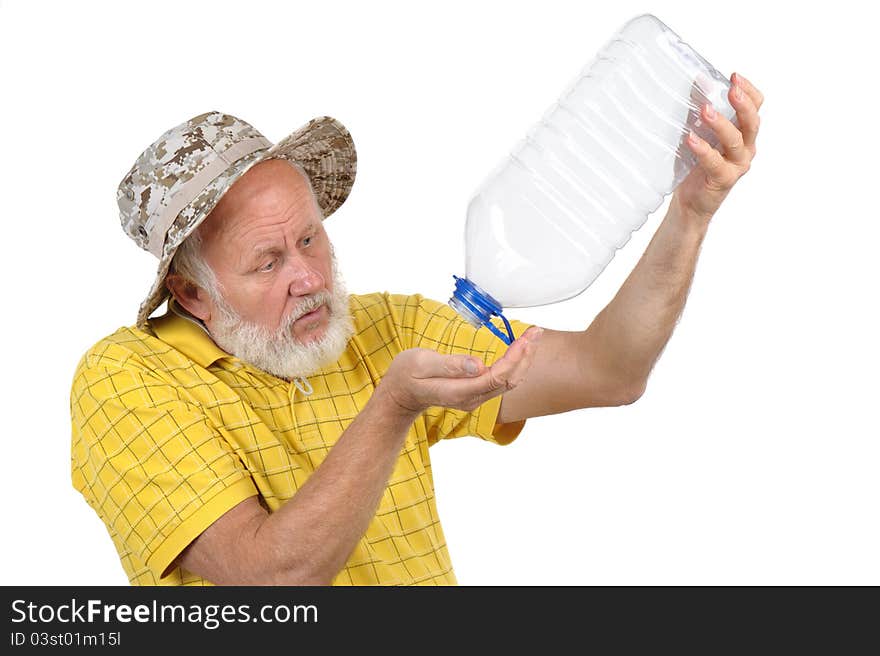 Senior bearded man failed to get water from empty plastic bottle. Senior bearded man failed to get water from empty plastic bottle